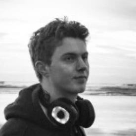 Theo Ochwat wearing Volta Audio headphones around his neck